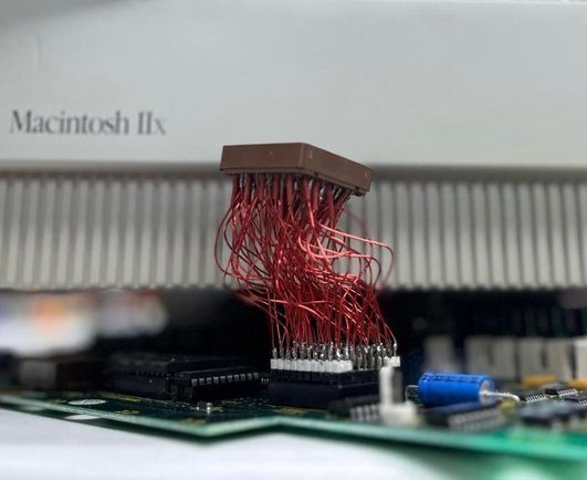 The Cordyceps Macintosh IIx. Enameled wire PLCC to PGA adapter